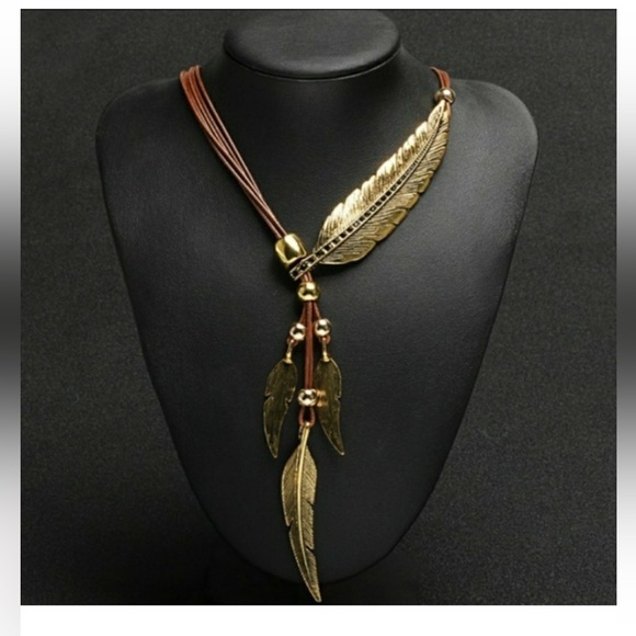 Anthropologie Jewelry - NWOT. Golden Feather Necklace. Bohemian look.